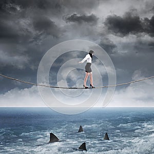 Business risk with woman on the rope