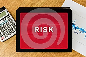 Business risk word on digital tablet