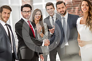 Business shaking hands with business partner