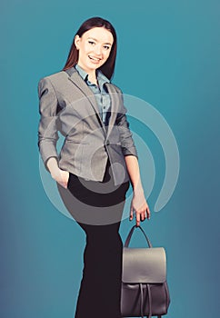 Business. Shool girl with knapsack. stylish woman in jacket with leather backpack. girl student in formal clothes