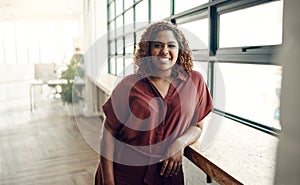 Business, smile and portrait of woman at office window, creative startup and project for entrepreneur at design agency