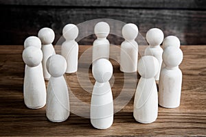 A business or social meeting concept with a crowd of generic figures forming a circle during a forum, meeting