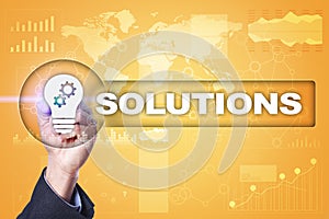 Business solutions concept on the virtual screen