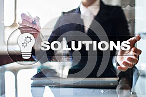 Business solutions concept on the virtual screen.