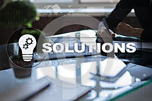 Business solutions concept on the virtual screen.