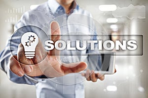 Business solutions concept on the virtual screen.