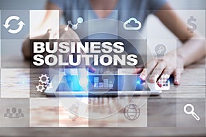 Business solutions concept on the virtual screen.