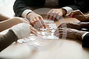 Business solutions and teamwork concept, multiracial team assemb photo