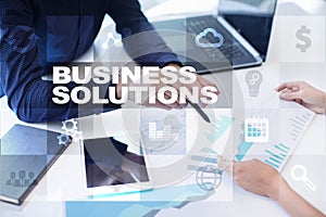 Business solutions on the virtual screen. Business concept.