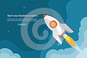 Business start up concept with launching rocket.