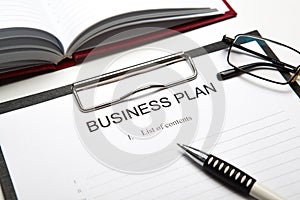 Business still life with business plan