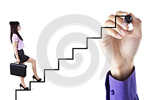 Business strategy with businesswoman climbing ladder