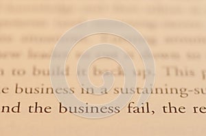 Business study text with blurred background