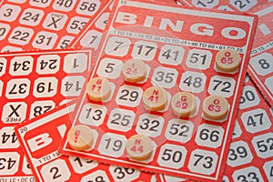 Business Success and Challenge Concept : Bingo card on white tile background.