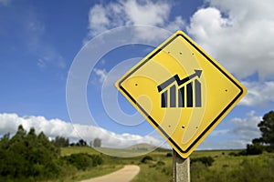 Business success concept road sign with graph icon