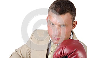 Business and success. Office fight. Young man in boxing gloves. Work and the battle. White background