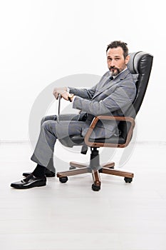 business success. professional leader ceo. businessman in office chair. man in suit representing leadership. business