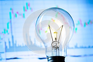 Business success with stock graph and light bulb