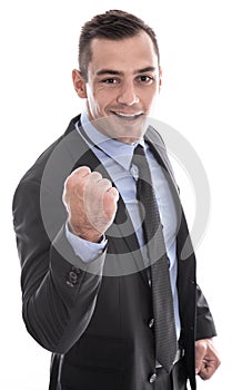 Business: successful man in suit and tie with fist facing camera