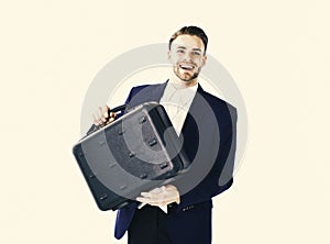 Business succsses. Business man with briefcase standing on white background.