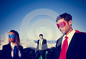 Business superheroes on the beach