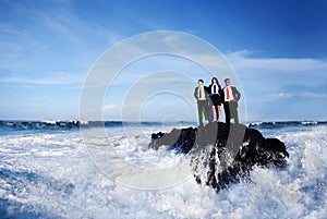 Business Superheroes On a Rock