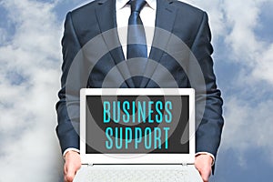 Business support advisor offers online help to businesss. Consultant worker in business suit