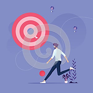 Business target concept-Businessman kick a pieces of big target to success