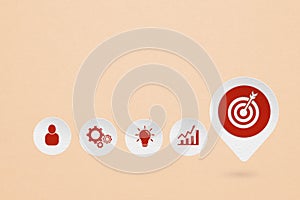 Business target and goal concept, red dartboard paper cut on grunge white check in icon with business sign on grunge orange