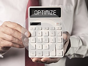 Business tax optimization concept. Word on calculator