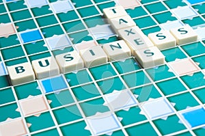 Business and taxes word made by letter pieces