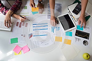 Business team adviser analysis financial data on paper denoting photo