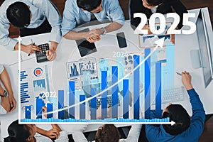 Business Team Analyzing Growth Chart with Data Visualization for Future Projections and Strategic Planning in a Modern