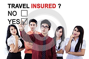 Business team approving travel insured in the meeting