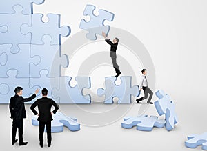 Business team building puzzle