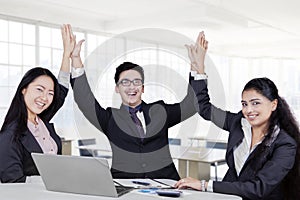 Business team celebrate their winning