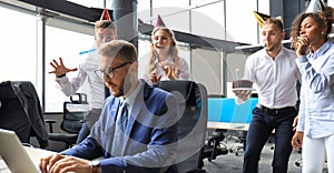 Business team celebrating a birthday of collegue in the modern office