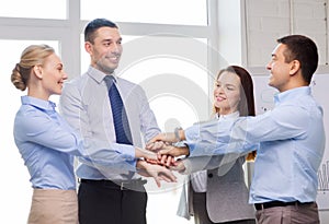 Business team celebrating victory in office