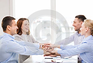 Business team celebrating victory in office