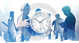 Business team with clock in city, schedule