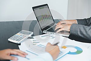 Business team collaboration discussing working analyzing with financial data and marketing growth report graph in team,