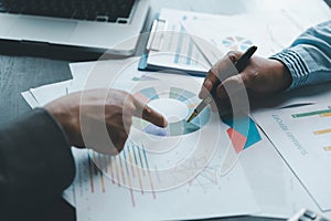 Business team collaboration discussing working analyzing with financial data and marketing growth report graph in team,