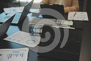 Business team collaboration discussing working analyzing with financial data and marketing growth report graph in team,