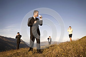 Business Team Communicating Outdoors Concept