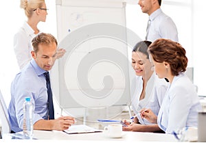 Business team discussing something in office