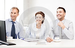 Business team discussing something in office