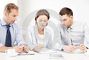 Business team discussing something in office