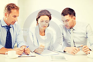 Business team discussing something in office