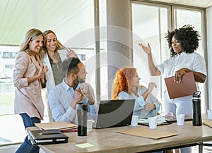 Business team happy and smiling after finishing a work project