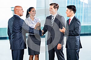 Business team having agreement and handshake
